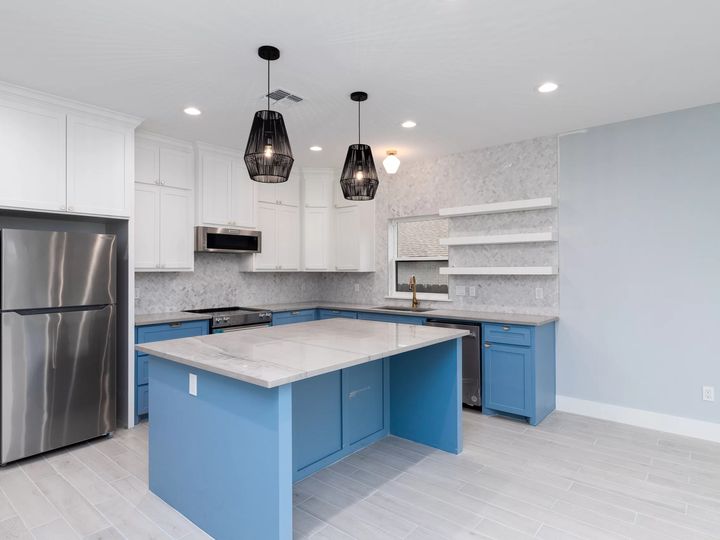 Kitchen with blue island