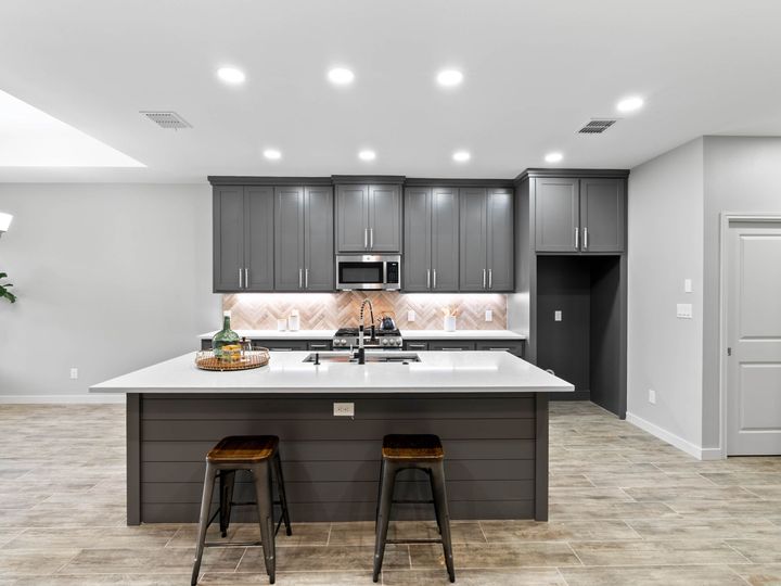 Kitchen with gray cabinetry