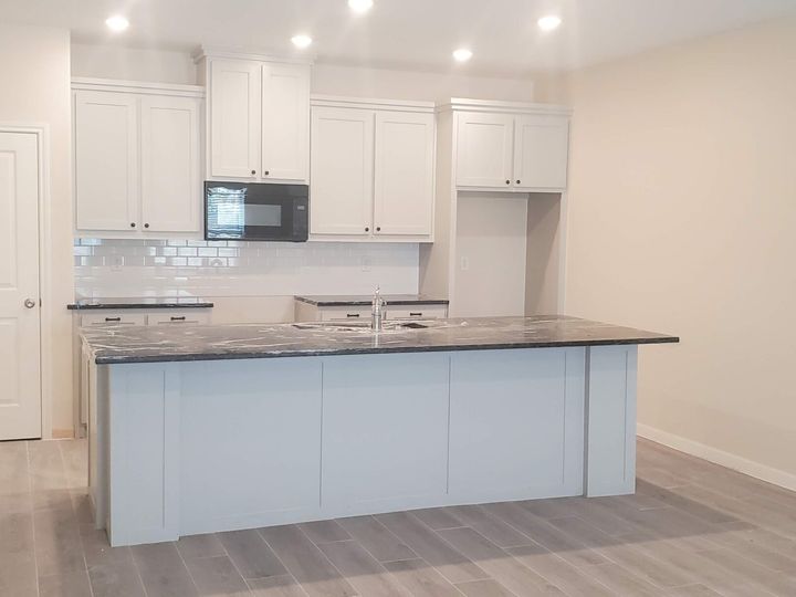 Kitchen with stone island