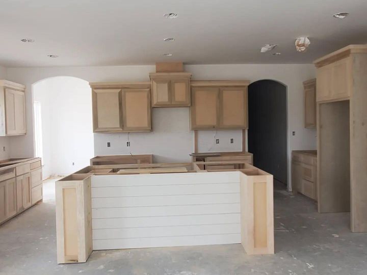 Kitchen cabinets going in