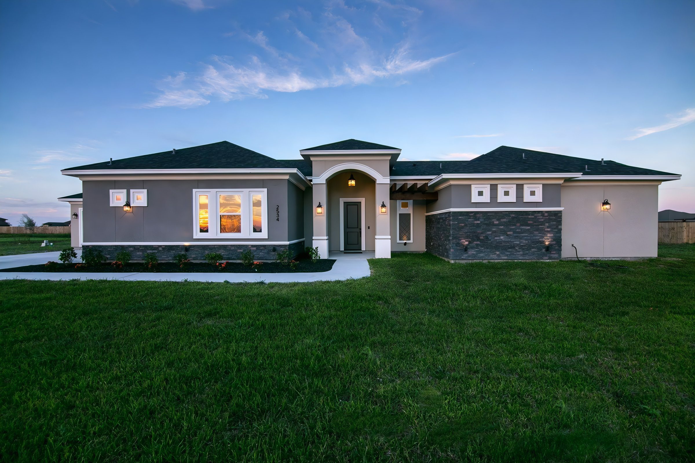 A single-family home in Corpus Christi at dusk