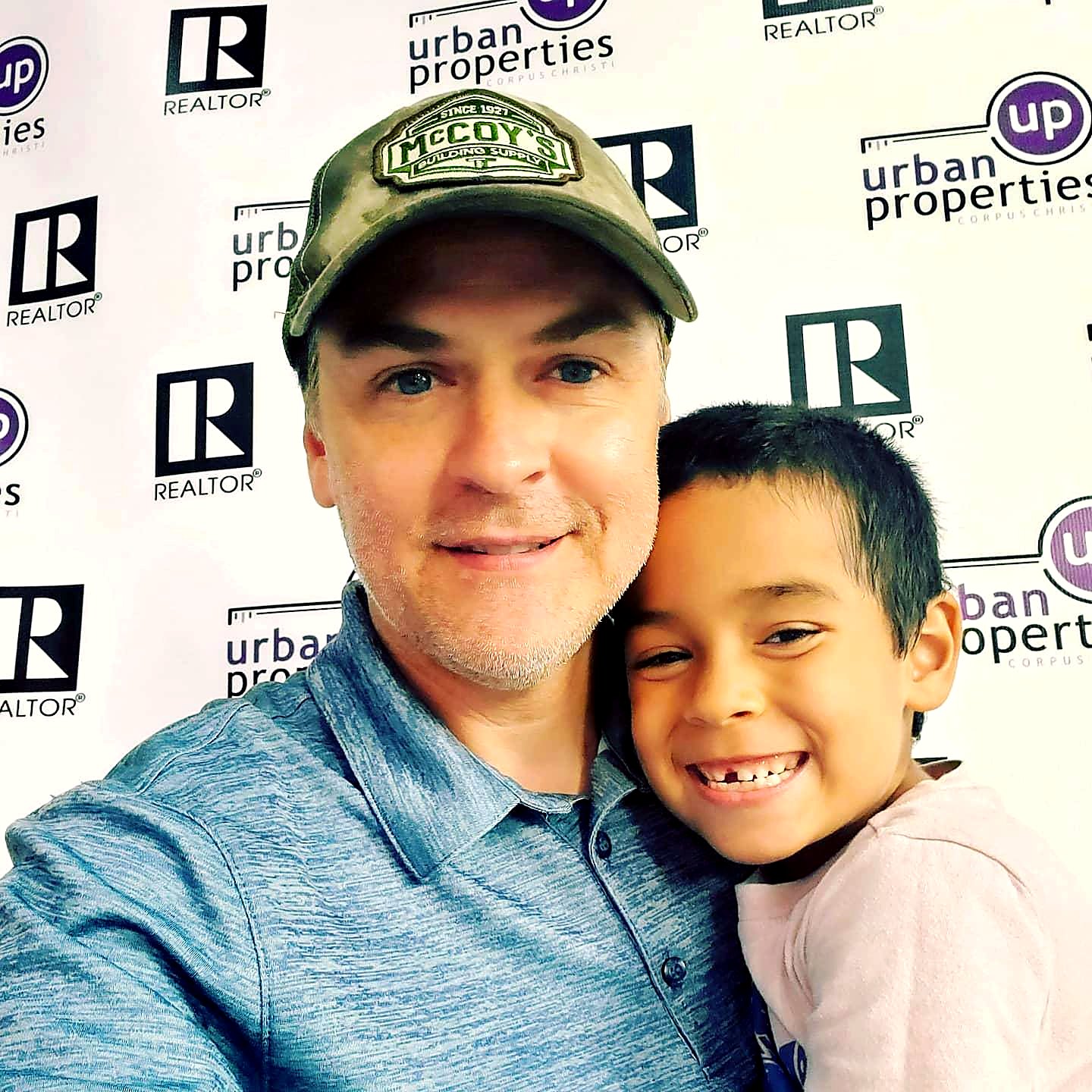 Jon Roel, broker and owner of Urban Properties, with his son