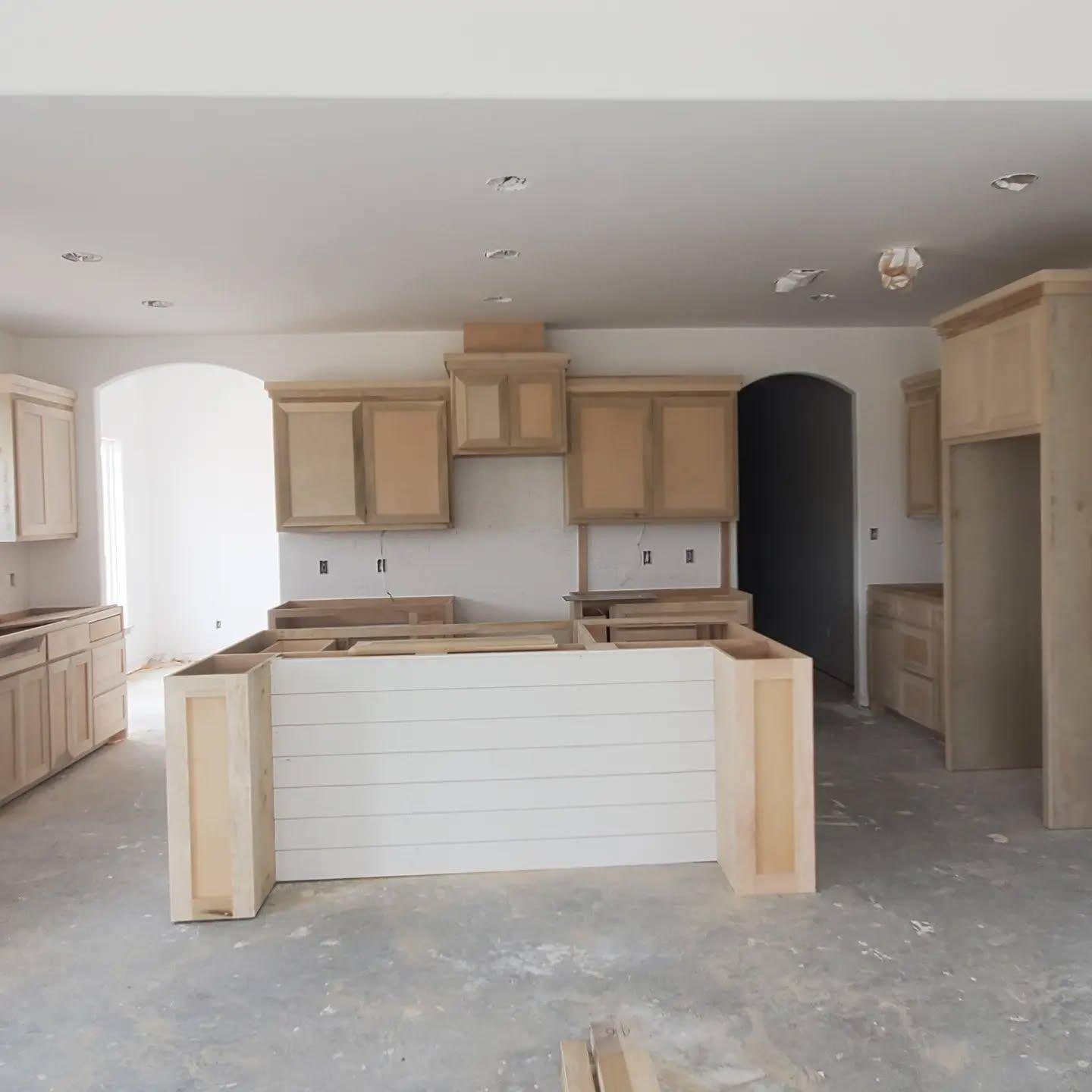 Kitchen cabinets going in